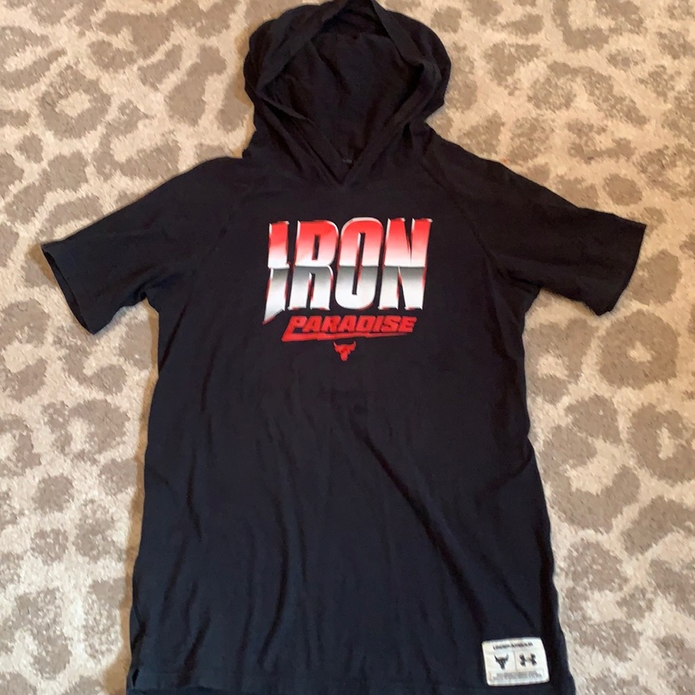 Underarmour YXL black hooded t shirt. The Rock series. Good condition.